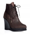 Utilitarian-chic bronze wedge booties from Rag & Bone - Channel your inner rugged style in these stylish hiking boot-inspired booties - Luscious dark brown leather in the on-trend lace-up style - Wear with slim jeans, a cashmere pullover, and a leather bomber jacket - Try with a denim midi-skirt, a tie-neck blouse and a tailored plaid blazer