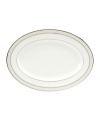 This versatile and stylish oval platter will coordinate perfectly with a variety of table linens and flatware. An ornate scroll motif trimmed in platinum adds a sophisticated sensibility to your tabletop.