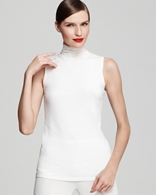 Exude modern elegance in this luxe Donna Karan New York sleeveless mock turtleneck, a year-round layering essential crafted in a fine gauge knit that flatters your shape. Exude modern elegance in this luxe Donna Karan New York sleeveless mock turtleneck, a year-round layering essential crafted in a fine gauge knit that flatters your shape.