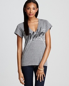 This Rebel Yell tee provides '80s nostalgia with a splashy Malibu graphic. This Rebel Yell tee provides '80s nostalgia with a splashy Malibu graphic.