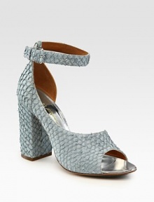 Elegant d'Orsay design in allover textured perch leather with an adjustable ankle strap and extra set of clear straps. Self-covered heel, 4 (100mm)Perch leather and PVC upperIncludes an extra set of clear strapsLeather lining and solePadded insoleImported Elegant d'Orsay design in allover textured perch leather with an adjustable ankle strap and extra set of clear straps. Self-covered heel, 4 (100mm)Perch leather and PVC upperIncludes an extra set of clear strapsLeather lining and solePadded insoleImported