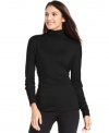 A wardrobe staple, this Alfani petite turtleneck top features ruching details for feminine flair!