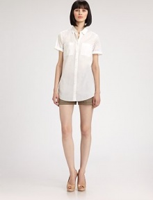 Crisp cotton, in a classic style with textural eyelet sleeves.Shirt collar with button detailsPatch pocketsShort, cuffed eyelet sleevesButton placketInverted back pleatAbout 25 from shoulder to hemCottonDry cleanImported of Swiss fabricModel shown is 5'9 (175cm) wearing US size 4. Crisp cotton, in a classic style with textural eyelet sleeves.Shirt collar with button detailsPatch pocketsShort, cuffed eyelet sleevesButton placketInverted back pleatAbout 25 from shoulder to hemCottonDry cleanImported of Swiss fabricModel shown is 5'9 (175cm) wearing US size 4.