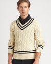 Fashioned in a heritage cable knit from luxe Italian cotton, a classic V-neck sweater is adorned with cricket stripes and herringbone wool elbow patches for authentic style.V-neckRibbed collar, cuffs and hemElbow patch detailCottonHand washImported