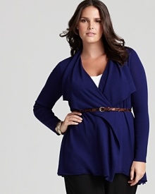 Rendered in jewel-toned merino wool, this Eileen Fisher open cardigan drapes effortlessly over pants and skirts alike, lending itself to both casual and professional looks. Rendered in jewel-toned merino wool, this Eileen Fisher open cardigan drapes effortlessly over pants and skirts alike, lending itself to both casual and professional looks.