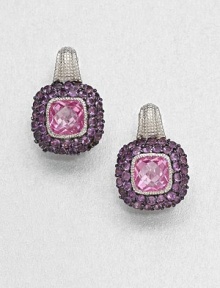 A cushion-cut pink corundum stone surrounded by pavé amethyst stones set in textured sterling silver. Pink corundum and amethystSterling silverLength, about .75Lever backImported 