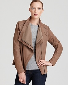 A new Elie Tahari buttery-soft leather jacket with a chic, cropped silhouette demands your attention. A new Elie Tahari buttery-soft leather jacket with a chic, cropped silhouette demands your attention.