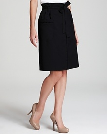 Grosgrain ribbon is woven through intricate open lattice work on this Elie Tahari skirt, imparting a delightfully couture quality to an everyday look. Grosgrain ribbon is woven through intricate open lattice work on this Elie Tahari skirt, imparting a delightfully couture quality to an everyday look.
