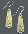 Southwestern inspiration. Jody Coyote's free-spirited style highlights sterling silver swirls on a green patina backdrop. Approximate drop: 1-1/2 inches.