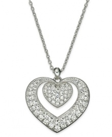 A heart worth loving. Eliot Danori's beautiful double heart pendant shines with pave crystal accents. Crafted in rhodium-plated mixed metal. Approximate length: 16 inches + 2-inch extender. Approximate drop: 5/8 inch. A heart worth loving. Eliot Danori's beautiful double heart pendant shines with pave crystal accents. Crafted in rhodium-plated mixed metal. Approximate length: 16 inches + 2-inch extender. Approximate drop: 5/8 inch.