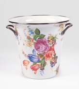 A traditionally shaped wine cooler in an exuberant floral design adds a gracious touch to entertaining. Floral design on enameled steel Antiqued brass handles and rim 8H X 8½ diam. Hand washing recommended Imported 