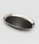 A distinctive gift for bar-keeping connoisseurs, crafted with a gleaming oval metal ring that slopes toward a dramatic base of black granite to evoke the majestic Southwest. Tarnish-resistant metal 11W X 2¾H X 19D Imported 