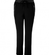 With a sporty cut and luxe lambskin waistband, Steffen Schrauts black drawstring pants are the perfectly versatile choice for dressing up and down - Leather elasticized drawstring waistband, zippered side slit pockets, cuffed ankles - Loosely tailored fit, ankle length - Wear with a feminine satin top and heels