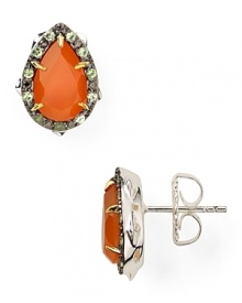 The garden serves as inspiration for this pair of thorn-shaped studs from Elizabeth and James, accented by striking carnelian and garnet stones. The garden serves as inspiration for this pair of thorn-shaped studs from Elizabeth and James, accented by striking carnelian and garnet stones.