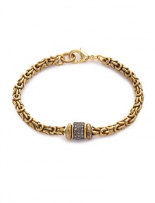THE LOOKLuxury CollectionIntricate antiqued 18k goldplated chain setting.08 tcw diamond rhodium-plated sterling silver accentLobster claspTHE MEASUREMENTLength, about 7ORIGINMade in USA THE LOOKLuxury CollectionIntricate antiqued 18k goldplated chain setting.08 tcw diamond rhodium-plated sterling silver accentLobster claspTHE MEASUREMENTLength, about 7ORIGINMade in USA