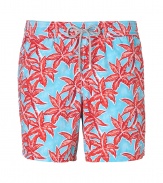A brand original style since the 70s detailed with a tropical floral print, Vilebrequins Moorea swim trunks are as fun as they are iconic - Waterproof elastic waistband, back flap pocket, side slit pockets, back eyelets for release of water, durable drawstring cord with stainless metal aglets, interior cotton briefs - Classic slim fit - Wear in the water, or post-swim with a polo and flip-flops - Comes with a logo printed drawstring pouch
