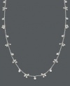 Perfect with a white blouse, even better doubled up with a little black dress. Long necklace by Lauren Ralph Lauren features clusters of silvertone beads. Crafted in mixed metal. Approximate length: 36 inches.