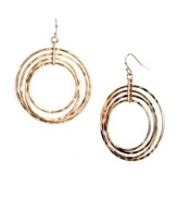 Round out your look in chic circles. Gleaming in gold tone mixed metal, Nine West's stylish drop earrings feature four graduated circles. Approximate drop: 1-1/2 inches.