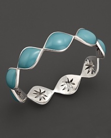 Sky blue enamel drops over a carved sterling silver bangle By Elizabeth Showers. Sky blue enamel drops over a carved sterling silver bangle By Elizabeth Showers.