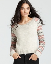 This Ella Moss sweater boasts vibrant argyle sleeves for clever juxtaposition. This Ella Moss sweater boasts vibrant argyle sleeves for clever juxtaposition.