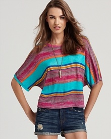Top off your weekend wardrobe with this vividly striped Michael Stars tee, complete with wide dolman sleeves for a billowy silhouette. Top off your weekend wardrobe with this vividly striped Michael Stars tee, complete with wide dolman sleeves for a billowy silhouette.