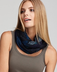 In an artsy allover block print, this super-soft Burberry scarf adds geometric flair and effortless style to the every day. In an artsy allover block print, this super-soft Burberry scarf adds geometric flair and effortless style to the every day.