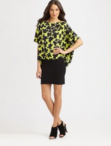 EXCLUSIVELY AT SAKS. A playful way to achieve that relaxed, contemporary aesthetic, this floral-print silk top has dropped shoulders and an asymmetrical hem. BoatneckDropped shouldersShort dolman sleevesAsymmetrical cropped front hemSilkDry cleanImportedModel shown is 5'9 (176cm) wearing US size X-Small/Small. EXCLUSIVELY AT SAKS. A playful way to achieve that relaxed, contemporary aesthetic, this floral-print silk top has dropped shoulders and an asymmetrical hem. BoatneckDropped shouldersShort dolman sleevesAsymmetrical cropped front hemSilkDry cleanImportedModel shown is 5'9 (176cm) wearing US size X-Small/Small.