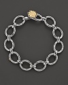 Classic Tacori style, in sterling silver links with a 18K yellow gold logo toggle clasp.