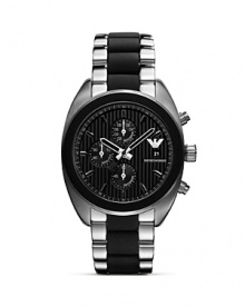 A hard-hitting take on sporty style, Emporio Armani's bold black-faced chronograph is an athletic add-on. Wear it to work or to work out; it will be on-trend anywhere you fasten it. A hard-hitting take on sporty style, Emporio Armani's bold black-faced chronograph is an athletic add-on. Wear it to work or to work out; it will be on-trend anywhere you fasten it.