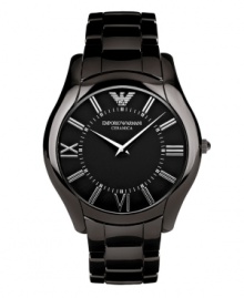 Sleek sophistication. Slim-profile watch by Emporio Armani crafted of black ceramic bracelet and round case. Black dial features silver tone Roman numerals, minute track, two hands and logo. Quartz movement. Water resistant to 30 meters. Two-year limited warranty.