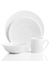 Inspired by the architecture of the famous Louvre Museum in Paris, this Bernardaud place setting is engraved with sweeping scrolls, fluting and other inspired sculptural details. Crafted in the exquisite white porcelain of the Lourve dinnerware collection.