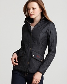 In a lightweight construction, Barbour's Calvalry Polarquilt jacket is classic in a quilted, waist length silhouette. A fleece lining adds concealed comfort. In a lightweight construction, Barbour's Calvalry Polarquilt jacket is classic in a quilted, waist length silhouette. A fleece lining adds concealed comfort.