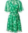 With a 1970s-inspired silhouette and a bold print, this Anna Sui dress boasts effortless new-season style - V-neck, wrap style with self-tie belt, short flutter sleeves, open back with two-button closure, full skirt, all-over print - Style with sky-high platforms and an oversized cardigan