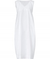 Detailed in crisp white cotton with an impeccable modern cut, Jil Sanders sleeveless dress is both immaculate and modern - V-neckline, sleeveless, side tuck detailing - Loosely draped fit, mid-length - Wear with sleek platform pumps and streamlined leather accessories