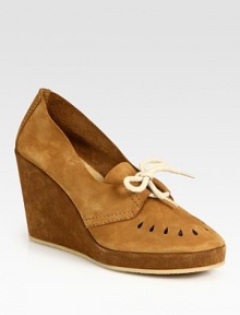 Perforated leather and suede classic with a lace-up front. Self-covered wedge, 4 (100mm)Self-covered platform, 1 (25mm)Compares to a 3 heel (75mm)Leather and suede upperLeather liningRubber solePadded insoleMade in FranceOUR FIT MODEL RECOMMENDS ordering true whole size; ½ sizes should order the next whole size up. Perforated leather and suede classic with a lace-up front. Self-covered wedge, 4 (100mm)Self-covered platform, 1 (25mm)Compares to a 3 heel (75mm)Leather and suede upperLeather liningRubber solePadded insoleMade in FranceOUR FIT MODEL RECOMMENDS ordering true whole size; ½ sizes should order the next whole size up.