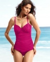 Go ahead, flatter yourself! This chic one-piece swimsuit from Miraclesuit flaunts allover ruching and body control for a streamlined look.