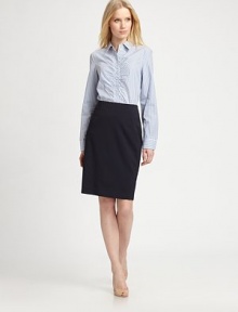 A classic button-down style complemented by allover stripes and an intriguing, gathered front.Collar neckButton detail on long sleevesGathered front detailsButton frontBack seamAbout 25 from shoulder to hemCottonHand washImported A classic button-down style complemented by allover stripes and an intriguing, gathered front.Collar neckButton detail on long sleevesGathered front detailsButton frontBack seamAbout 25 from shoulder to hemCottonHand washImported