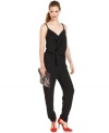 A chic alternative to a dress, this RACHEL Rachel Roy ruffled jumpsuit is super hot for soiree style!