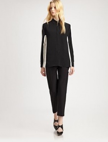 Timelessly tailored silk shirt, rejuvenated by shadow-inspired contrast paneling that visually slims the waist. Point collarLong sleeves with buttoned cuffsHidden button frontSilkDry cleanImportedModel shown is 5'10 (177cm) wearing US size 2. Timelessly tailored silk shirt, rejuvenated by shadow-inspired contrast paneling that visually slims the waist. Point collarLong sleeves with buttoned cuffsHidden button frontSilkDry cleanImportedModel shown is 5'10 (177cm) wearing US size 2.