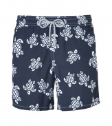 A brand original style since the 70s detailed with a stenciled turtle print, Vilebrequins Moorea swim trunks are as fun as they are iconic - Waterproof elastic waistband, back flap pocket, side slit pockets, back eyelets for release of water, durable drawstring cord with stainless metal aglets, interior cotton briefs - Classic slim fit - Wear in the water, or post-swim with a polo and flip-flops - Comes with a logo printed drawstring pouch