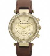Adorned with shimmering Swarovski elements, this golden hued watch from Michael Kors brings everyday elegance.