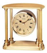 Add stately charm to any tabletop with this refined desk clock from Seiko. Goldtone solid brass four-column frame and floating round case. Round goldtone dial with logo and roman numeral indices. Battery included. Measures approximately 5-1/2 x 5-1/2 x 2.