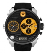 Never lose a second with this multifunctional watch by Diesel. Black canvas bracelet and round stainless steel case with black ion-plated bezel. Black knurled dial features three yellow-accented analog display dials, date window, chronograph, one digital display window and logo. Quartz movement. Water resistant to 30 meters. Two-year limited warranty.