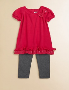 Sweet bows, sequins and ruffles adorn this adorable sweater tunic and leggings set. Tunic Ribbed roundneckShort puff sleevesBow and sequin accentsRuffled hemBack keyhole with button closure Leggings Elastic waistbandPull-on styleTunic: cotton/acrylicLeggings: cotton/spandexMachine washImported Sweet bows, sequins and ruffles adorn this adorable sweater tunic and leggings set. Tunic Ribbed roundneckShort puff sleevesBow and sequin accentsRuffled hemBack keyhole with button closure Leggings Elastic waistbandPull-on styleTunic: cotton/acrylicLeggings: cotton/spandexMachine washImported