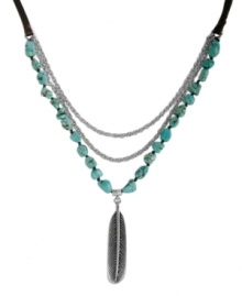 Light as a feather, heavy fashion. Lucky Brand's chic frontal necklace features a three-row design combining semi-precious reconstituted turquoise stones, silver tone mixed metal chains and a detailed feather charm. Draped on a nylon cord. Approximate length: 36 inches. Approximate drop: 3-3/4 inches. Light as a feather, heavy fashion. Lucky Brand's chic frontal necklace features a three-row design combining semi-precious reconstituted turquoise stones, silver tone mixed metal chains and a detailed feather charm. Draped on a nylon cord. Approximate length: 36 inches. Approximate drop: 3-3/4 inches.