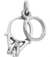 The perfect gift for the bride to be. This sweet charm features a wedding band and engagement ring decorated with a round-cut cubic zirconia accent. Crafted in 14k white gold. Chain not included. Approximate length: 3/5 inch. Approximate width: 3/10 inch.