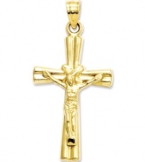 Inspire your look with a little faith. This intricate crucifix charm features a diamond-cut, reversible design. Crafted in 14k gold. Chain not included. Approximate length: 1 inch. Approximate width: 6/10 inch.