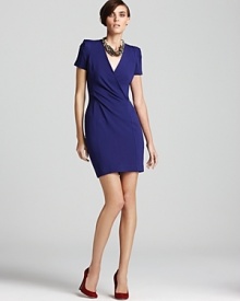 Chic details lend this stretch French Connection dress the perfect hint of femininity for an alluring office look. Chic details lend this stretch French Connection dress the perfect hint of femininity for an alluring office look.