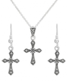 There's more than one way to express your faith. Genevieve & Grace's symbolic and sophisticated jewelry set features a matching cross pendant and drop earrings. Set in sterling silver with marcasite accents. Approximate length: 18 inches. Approximate drop length (pendant): 1 inch. Approximate drop width (pendant): 1/2 inch. Approximate drop length (earrings): 1-3/8 inches. Approximate drop width (earrings): 1/2 inch. There's more than one way to express your faith. Genevieve & Grace's symbolic and sophisticated jewelry set features a matching cross pendant and drop earrings. Set in sterling silver with marcasite accents. Approximate length: 18 inches. Approximate drop length (pendant): 1 inch. Approximate drop width (pendant): 1/2 inch. Approximate drop length (earrings): 1-3/8 inches. Approximate drop width (earrings): 1/2 inch.