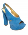Just the right amount of retro. The Pizana sandals by GUESS get groovy with bold hues of suede and an ultra-chunky heel.